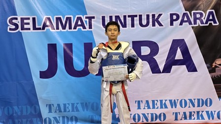 ABIMANYU, SISWA X-J, RAIH JUARA 3 TAEKWONDO WALI KOTA CUP XI