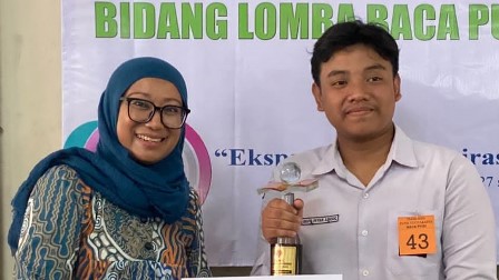 DHAFIN FAVIAN ASHODIQ RAIH JUARA 1 LOMBA BACA PUISI FLS2N TINGKAT KOTA YOGYAKARTA 
