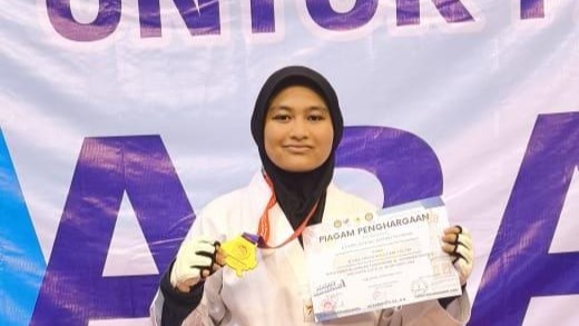 KANZHA RAIH MEDALI EMAS TAEKWONDO