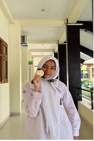 MEDALI PERAK UNTUK MUHI