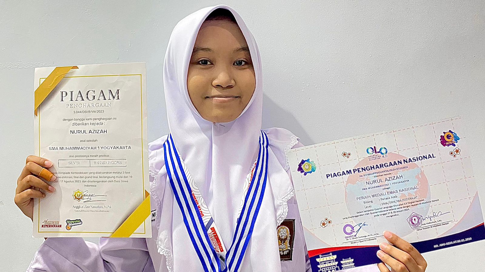 NURUL AZIZAH SABET MEDALI PERAK DAN EMAS OLIMPIADE BAHASA ARAB DAN INGGRIS NASIONAL 